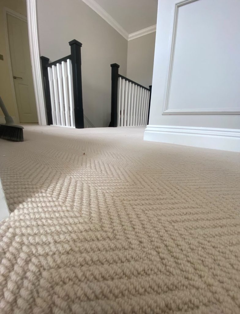 Deep charcoal carpet in a contemporary living room